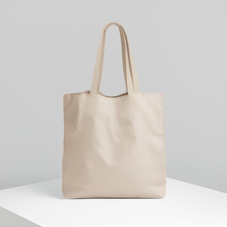 Cotton tote bag on a white plinth